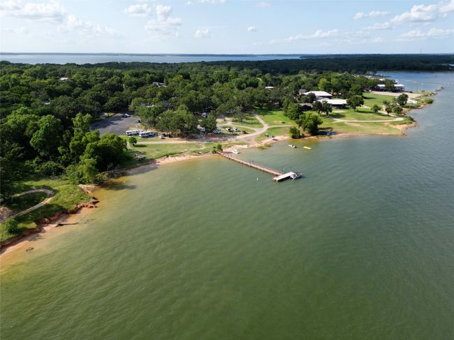 Drone / aerial view of the sandy beach shoreline to stroll minutes from your doorstep. | Image 28