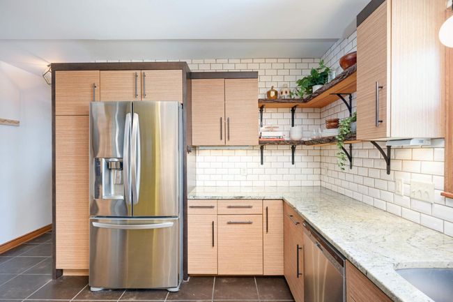 Stunning granite countertops really make this space one to enjoy. | Image 14