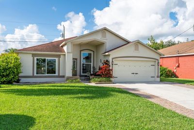 6304 Adams Street, House other with 4 bedrooms, 2 bathrooms and null parking in Jupiter FL | Image 2