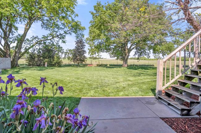View of yard featuring stairway and a patio area | Image 30