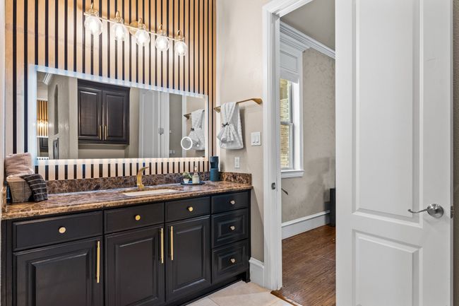 Bathroom with vanity and baseboards | Image 19