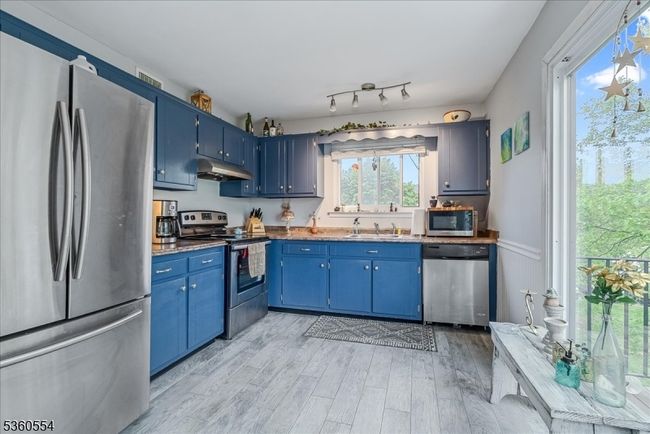 7117 Dell Pl, Townhouse with 2 bedrooms, 1 bathrooms and null parking in Stanhope NJ | Image 5