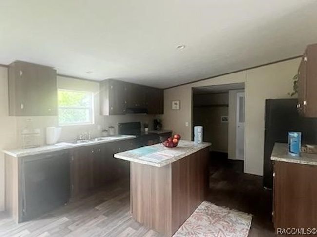 11211 Se 201 St St, House other with 4 bedrooms, 2 bathrooms and 1 parking in INGLIS FL | Image 4