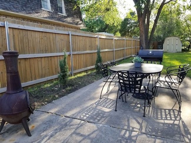 Uncovered patio area or extra parking | Image 17