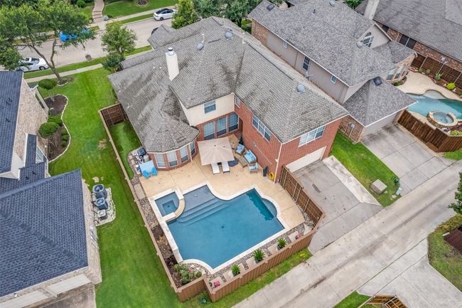 View of property, side yard has pool equipment and astro turf for complete no mow backyard! | Image 8