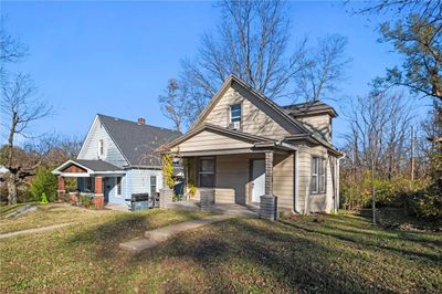 View of front of home featuring a porch and a front yard | Image 3