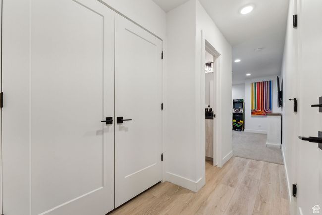 Hallway featuring light wood-type flooring | Image 35