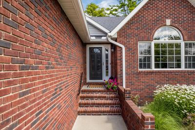 Brick front elevation with welcoming entryway | Image 2