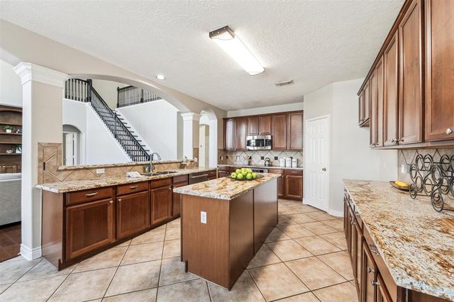 11405 Starlight Bay St, House other with 5 bedrooms, 4 bathrooms and 3 parking in Pearland TX | Image 12