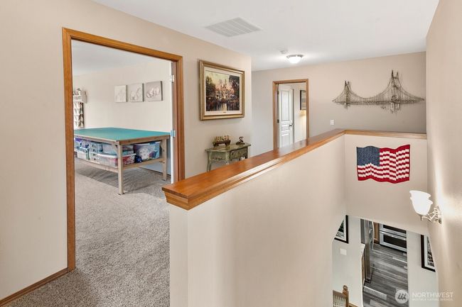 Upstairs hallway is bright and wide! | Image 15