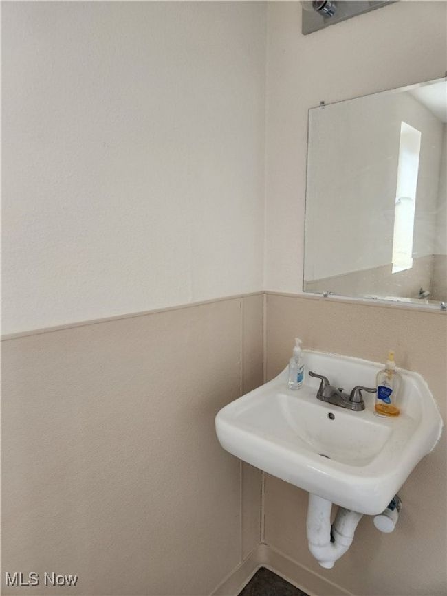 Bathroom featuring a sink | Image 9