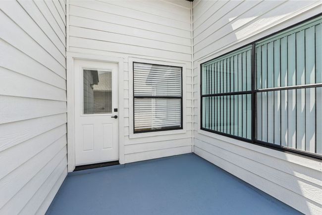 View of exterior entry with a patio | Image 30