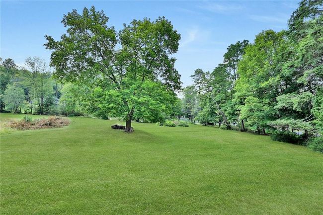 Expansive lawn for fun and play. | Image 17