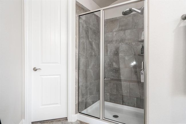Separate tub and shower in primary bath. | Image 26