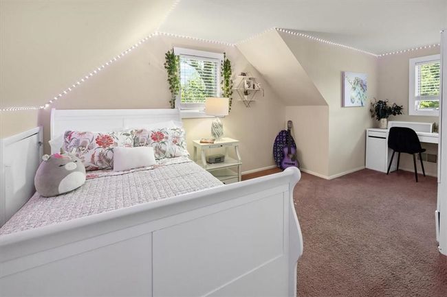 2nd Floor Carpeted bedroom featuring lofted ceiling | Image 20