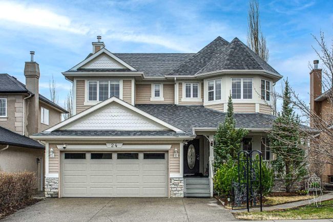 24 Discovery Ridge Rise Sw, Home with 4 bedrooms, 5 bathrooms and 4 parking in Calgary AB | Image 1