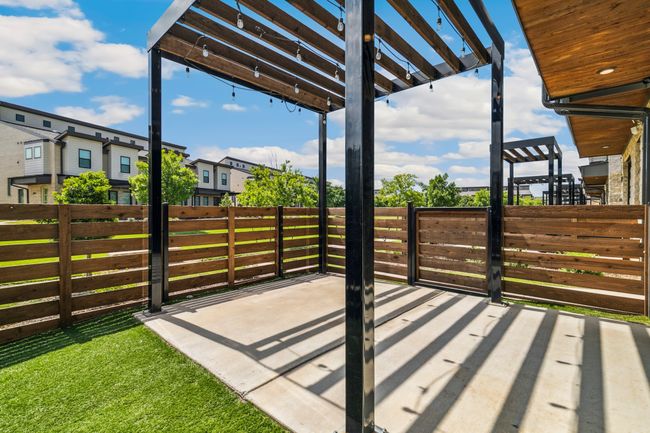 View of patio with a residential view | Image 4