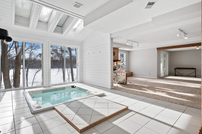 Here is an alternate look from the spa room looking into the family room. This is the perfect place to relax and unwind after a long day. | Image 32