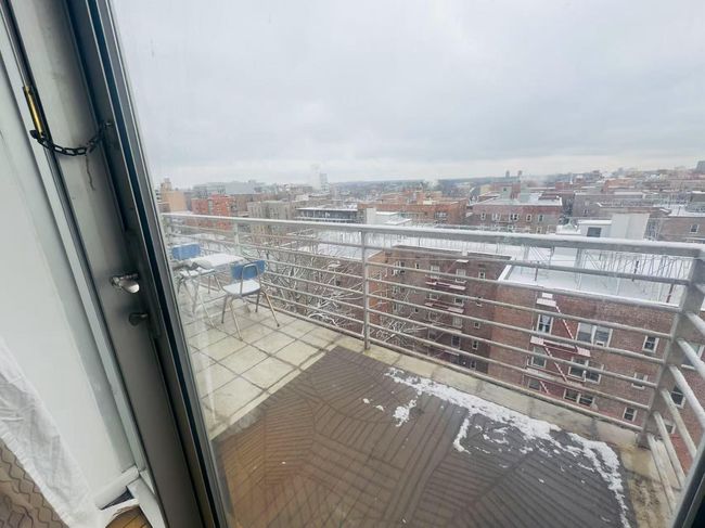 Balcony featuring a view of city | Image 7