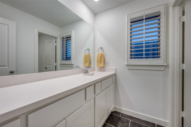 Bathroom with vanity and baseboards | Image 29