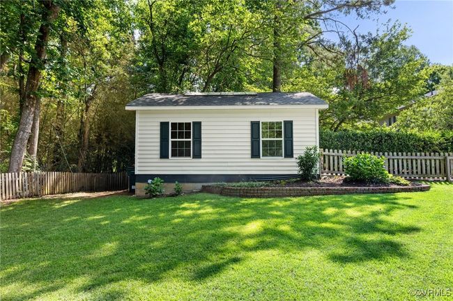 Side view from rear yard of the one-car garage. | Image 38