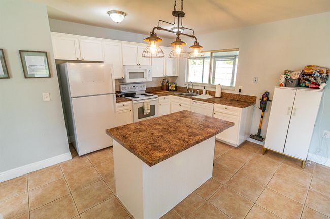 2097 Se New York St, House other with 4 bedrooms, 2 bathrooms and null parking in Port Saint Lucie FL | Image 12