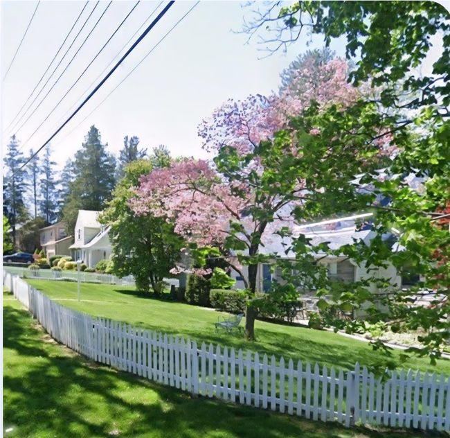 View of fenced yard | Image 49