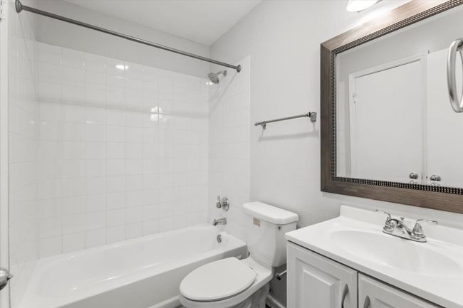 Bathroom for back bedroom and guest with tub / shower combination | Image 20