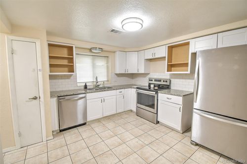 1658 Chester St, Aurora, CO, 80010-1915 | Card Image