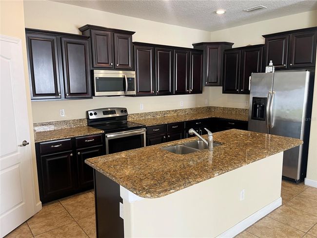 1711 Penrith Loop, House other with 4 bedrooms, 3 bathrooms and null parking in Orlando FL | Image 8