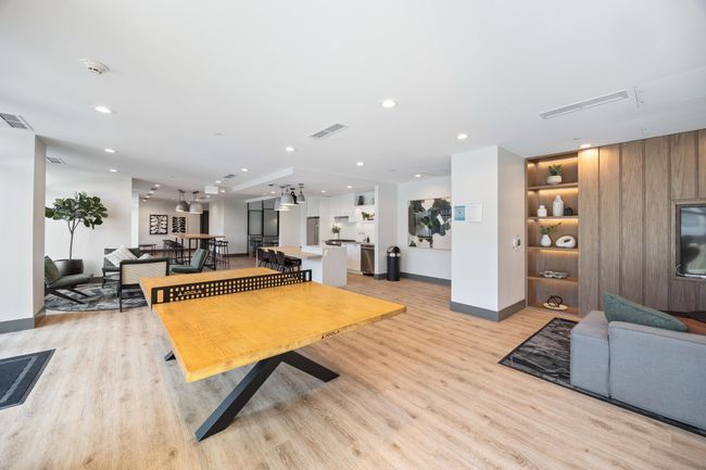 Living room with recessed lighting, visible vents, baseboards, and light wood-type flooring | Image 20