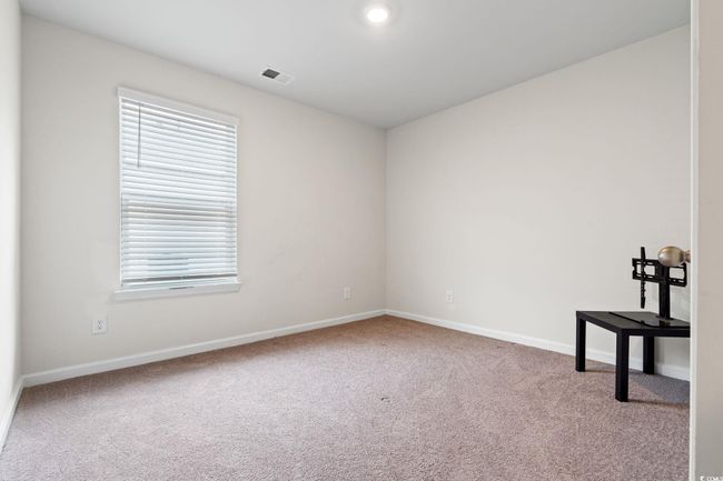 Spare room featuring carpet floors | Image 22