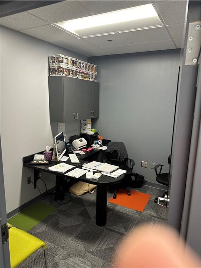 Carpeted office space with a paneled ceiling | Image 27