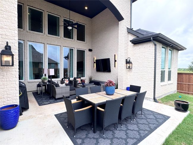 View of patio with an outdoor living space and outdoor dining space | Image 37