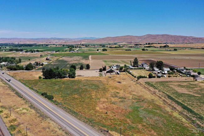 View of rural area with a mountain backdrop | Image 5