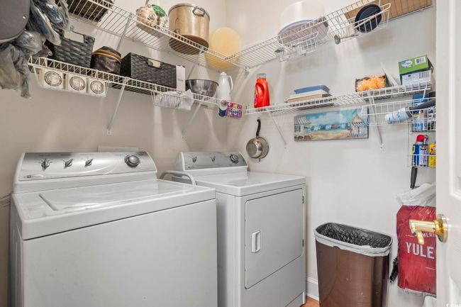Laundry area featuring independent washer and dryer and laundry area | Image 13