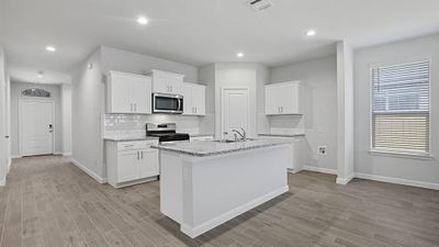 Kitchen - All Home and community information, including pricing, included features, terms, availability and amenities, are subject to change at any time without notice or obligation. All Drawings, pictures, photographs, video, square footages, floor plans, elevations, features, colors and sizes are approximate for illustration purposes only and will vary from the homes as built. | Image 2