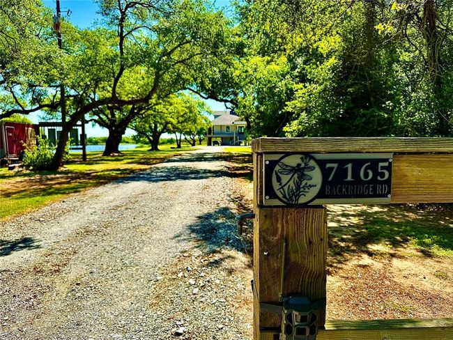 7165 Backridge Rd, House other with 6 bedrooms, 7 bathrooms and 2 parking in Sabine Pass TX | Image 44