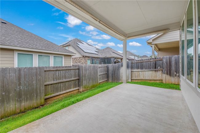 Fenced backyard featuring a patio area | Image 18