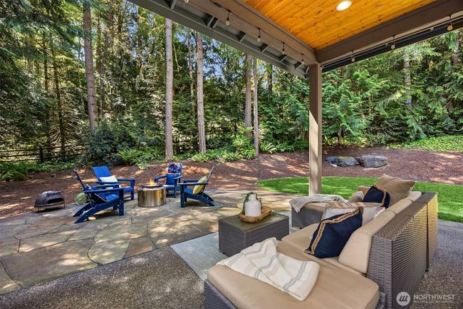 Enjoy the outdoors on your covered patio. There is an outside propane connection for your grill. | Image 30