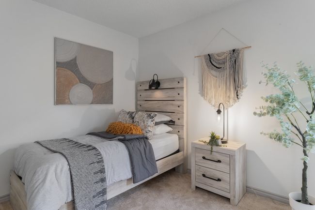 Bedroom with light colored carpet | Image 38