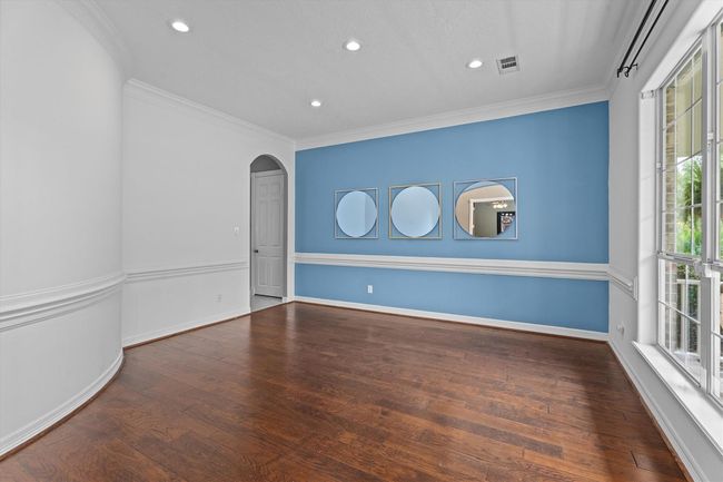 Formal dining room with lovely views onto the front lawn | Image 10