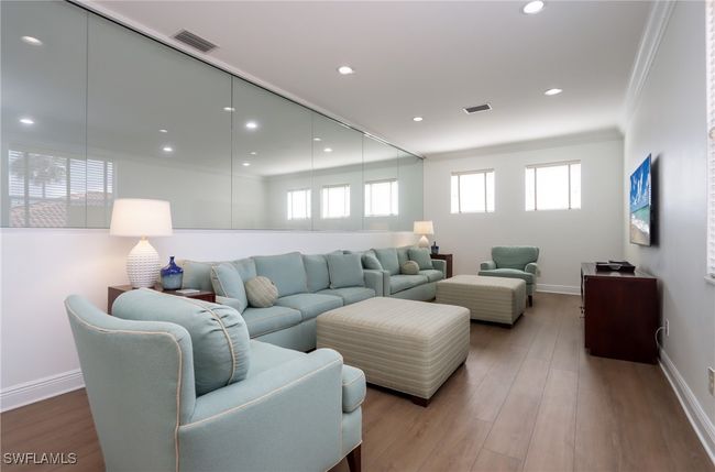 Living room with ornamental molding, wood finished floors, and recessed lighting | Image 14