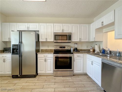 a-102-7794 Emerald Cir, NAPLES, FL, 34109-1784 | Card Image