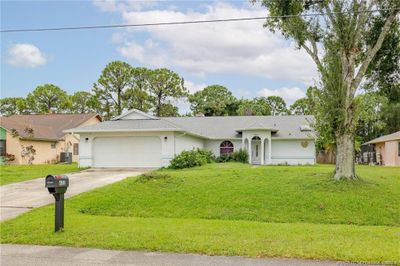 622 Se Portage Avenue, House other with 4 bedrooms, 2 bathrooms and 2 parking in Port Saint Lucie FL | Image 1