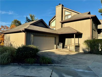 View of front of home featuring a garage | Image 3