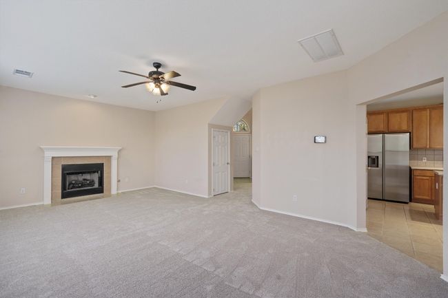 Living room with fireplace | Image 7