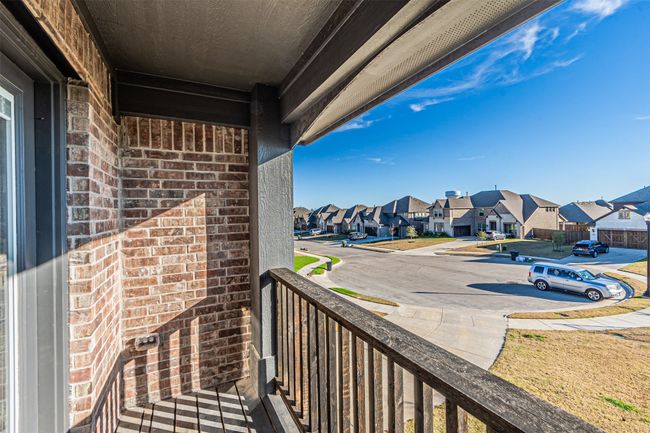 Balcony featuring a residential view and covered porch | Image 27