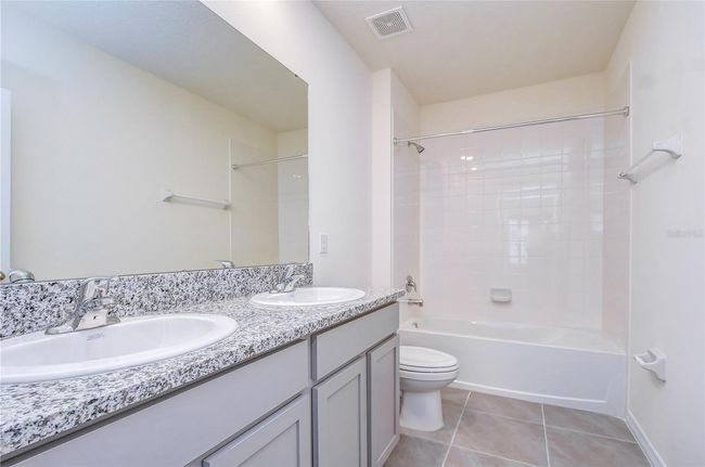 9176 Forge Breeze Loop, House other with 5 bedrooms, 3 bathrooms and null parking in WESLEY CHAPEL FL | Image 18