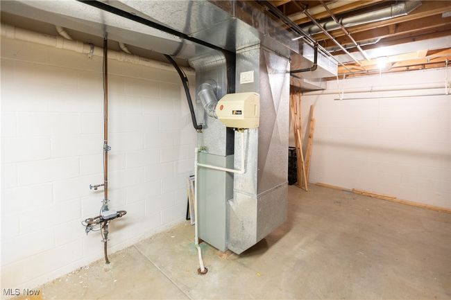 Furnace and hot water tank in the unfinished side | Image 32
